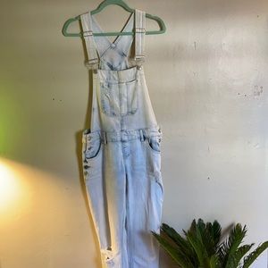 Distressed light denim overalls